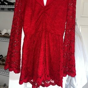 Red jumpsuit. Size S. Good condition. Bought at boutique.